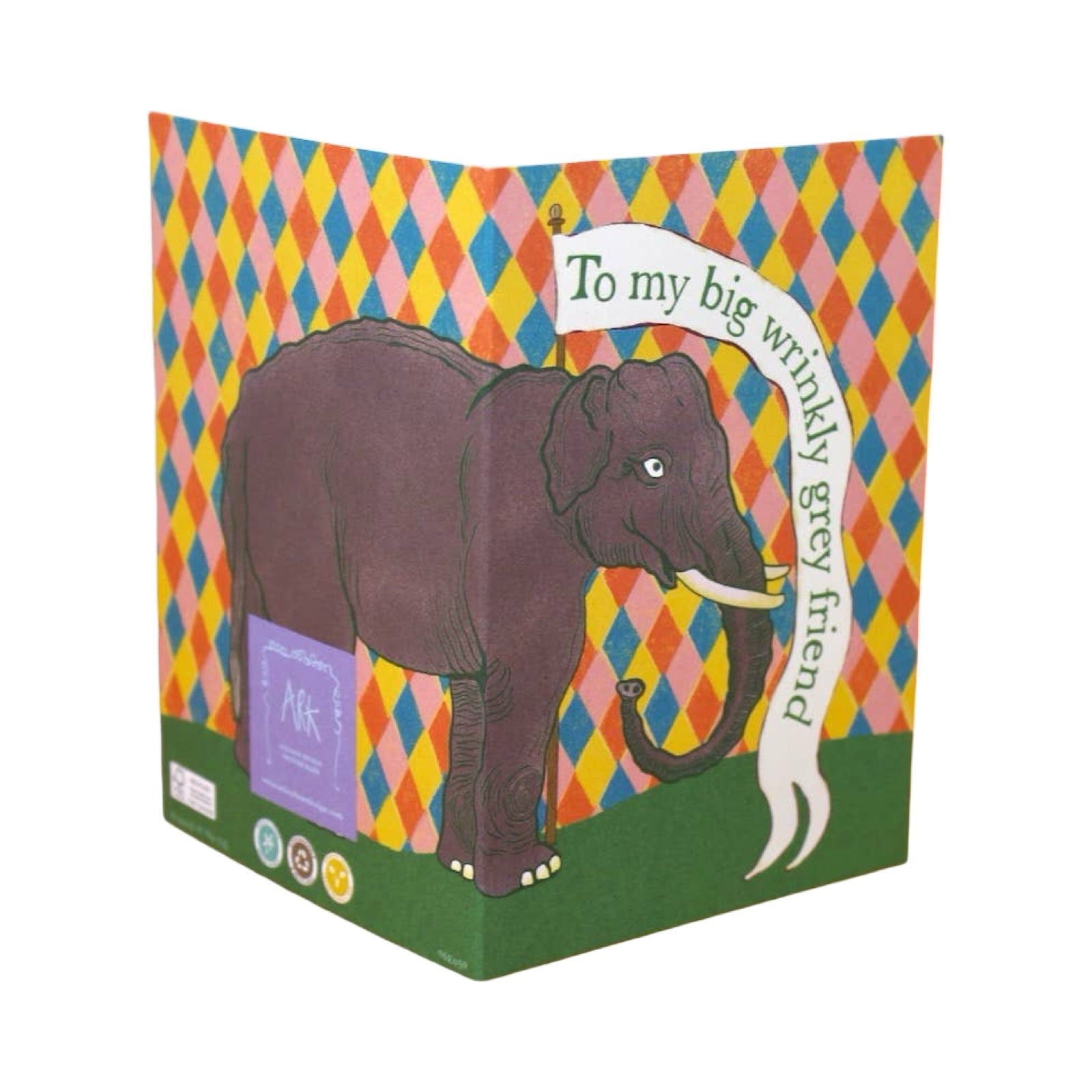 This card is for an old g=friend with a good sense of humour, it features a grey elephant standing on grass with a bright diamond coloured background, and the text "To My Wrinkly Grey Friend'.