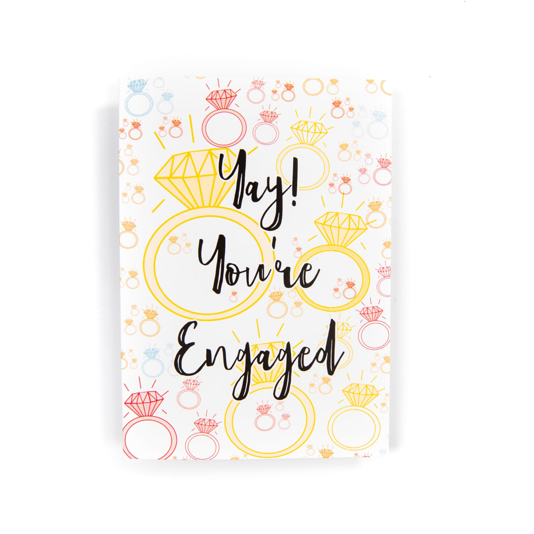 Card with 'Yay! You're Engaged' text and diamond ring illustrations on a white background