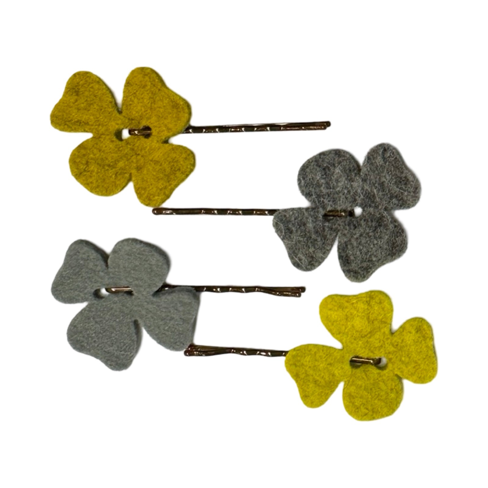 Floral hair slides in green and grey.