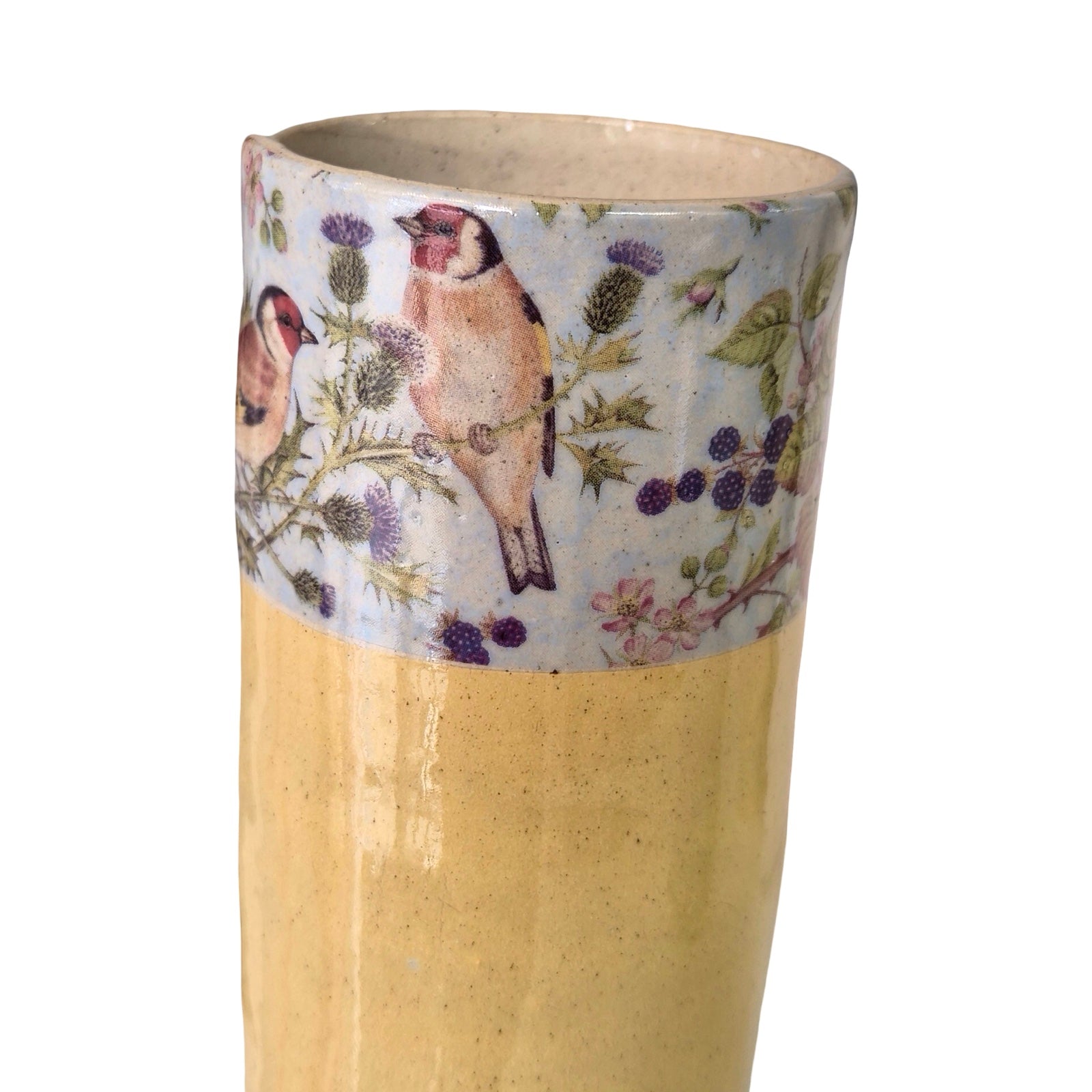 Tall vase with bird and floral design on a white background.