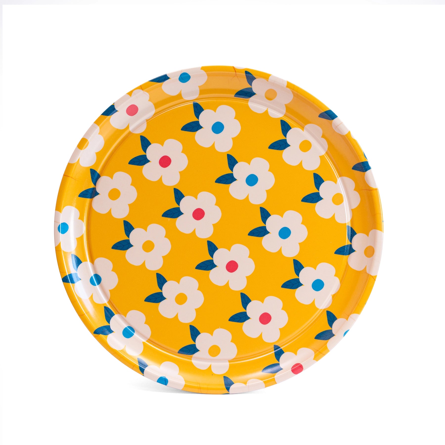 A round yellow plate with a repeating pattern of white flowers, blue leaves, and small pink and blue centres, shown on a plain white background.