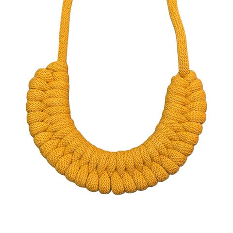 A hand-knotted style necklace made by hand from 100% recycled yellow cotton cord with a magnetic metal fastening.