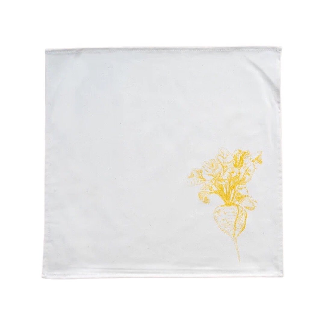 Cream cotton napkin with a yellow sugar beet.